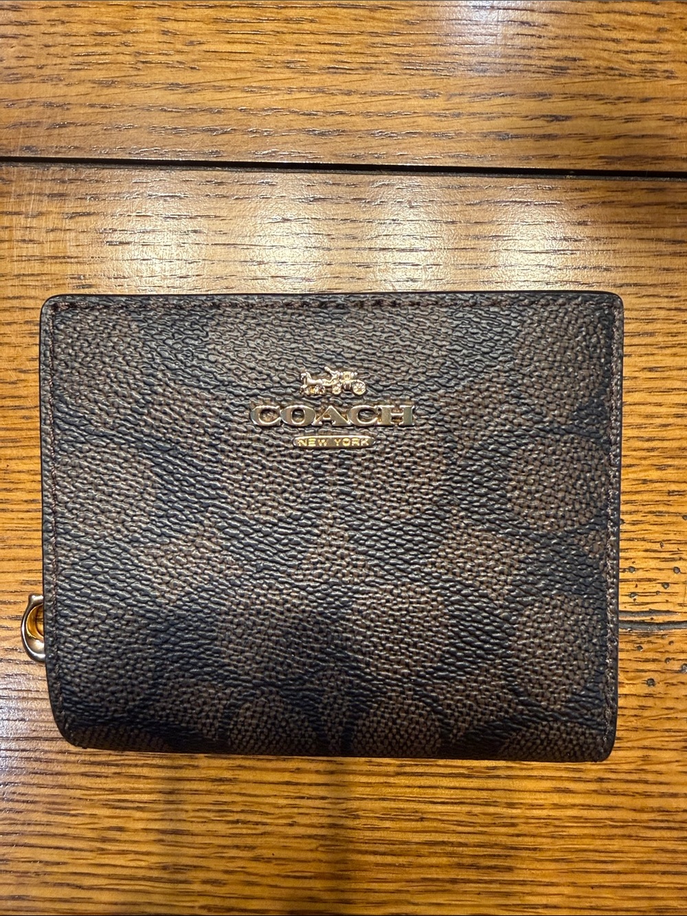 Coach Brown Pebbled Leather Bifold Wallet with Gold Logo